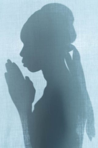 Woman in Prayer